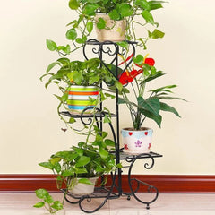 Victorian Four-Tier Plant Stand with Scrollwork Design